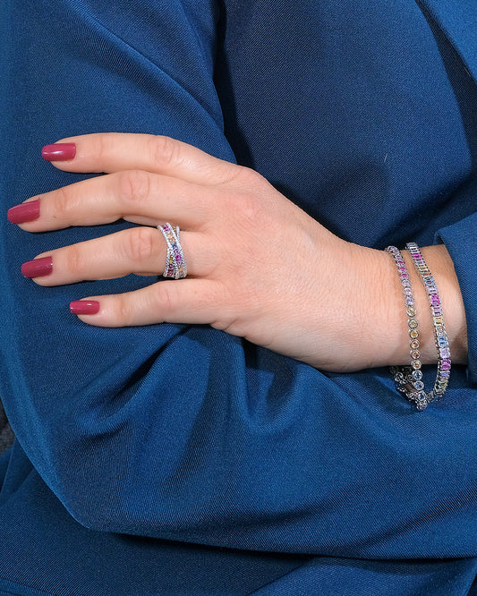 Anillo cruzado con circonitas de colores