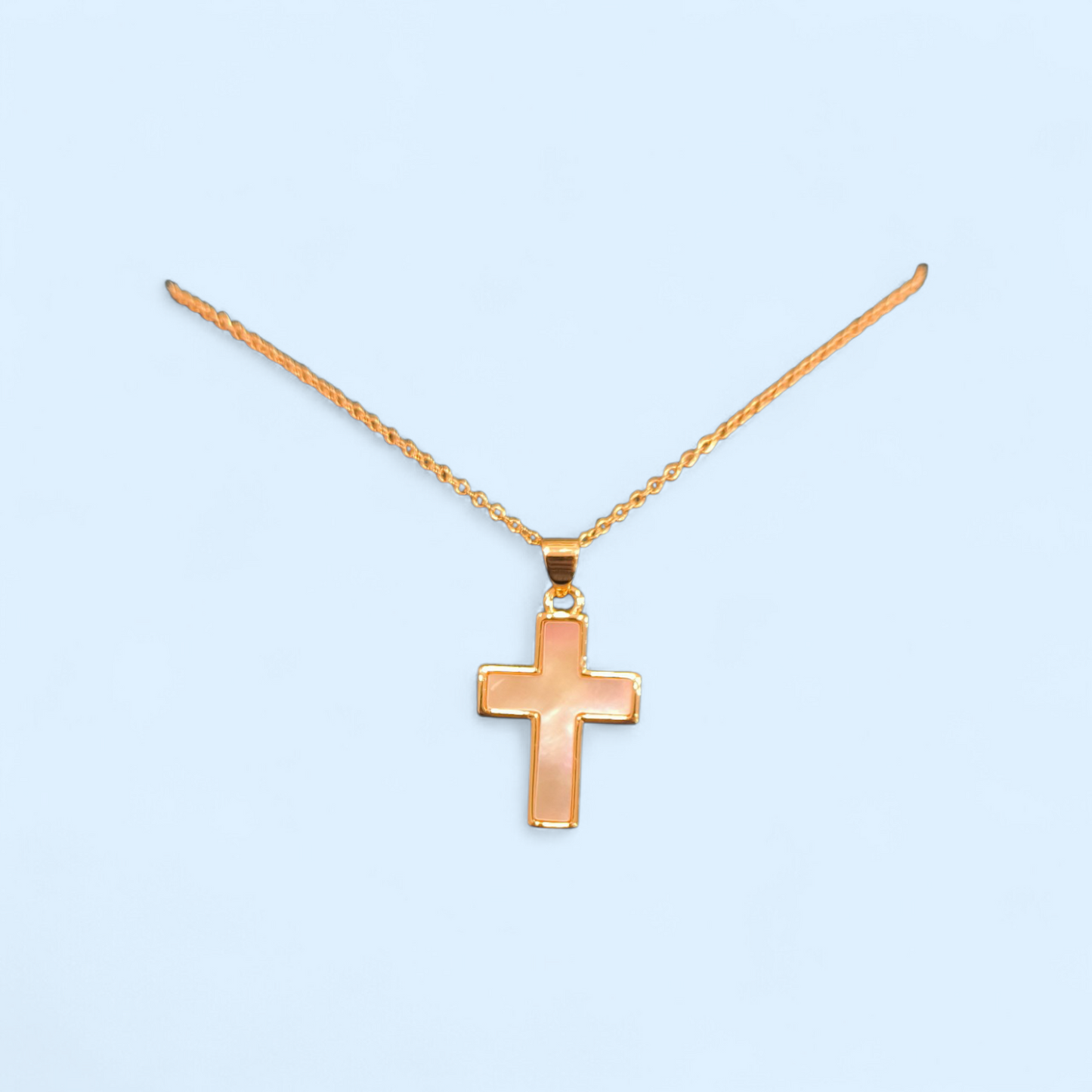 Cruz de nácar con baño de oro