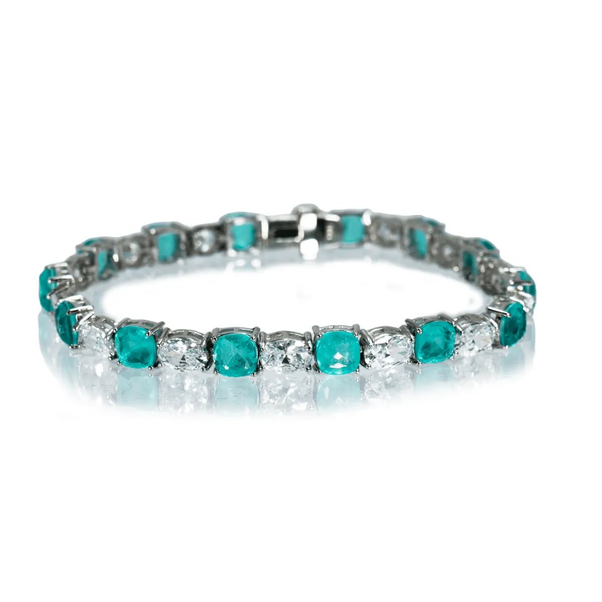 Silver jewel bracelet with paraiba emerald zircons combined in differe Kebel