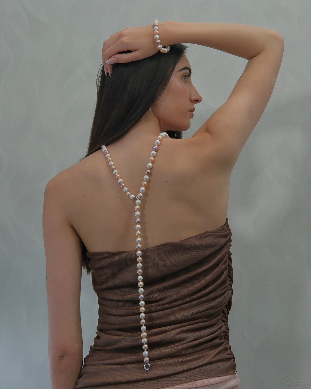 Cultured pearl bracelet with colored silver clasp