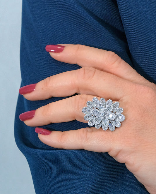 Anillo flor joya en plata orlas oval con circonitas