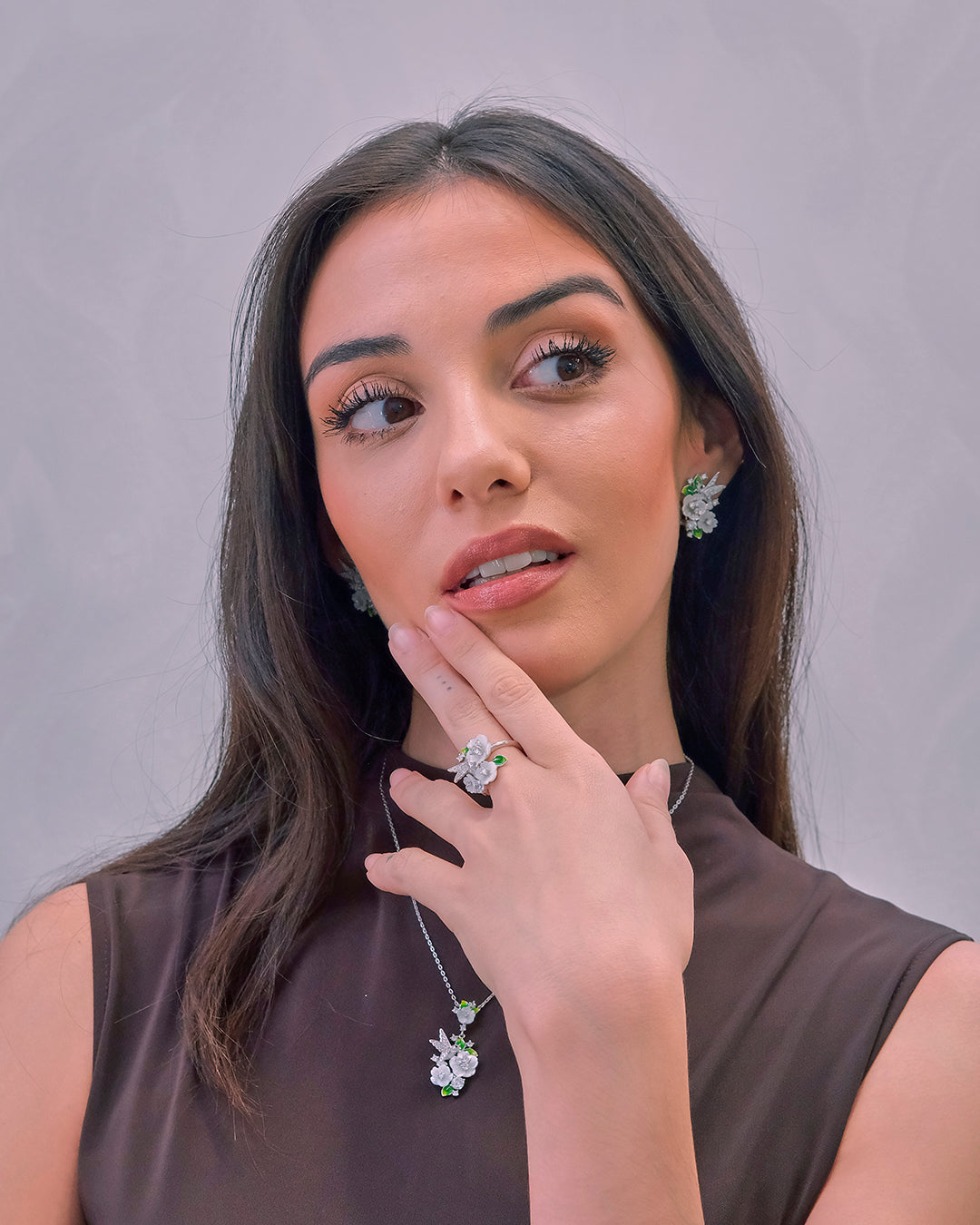 Silver ring with flowers and a little bird 