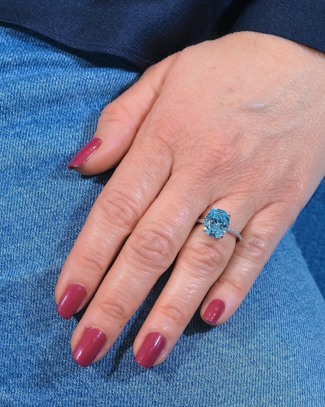 Aquamarine ring with oval aquamarine in claws