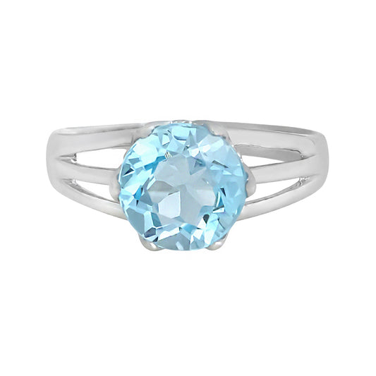 Silver ring with central aquamarine stone