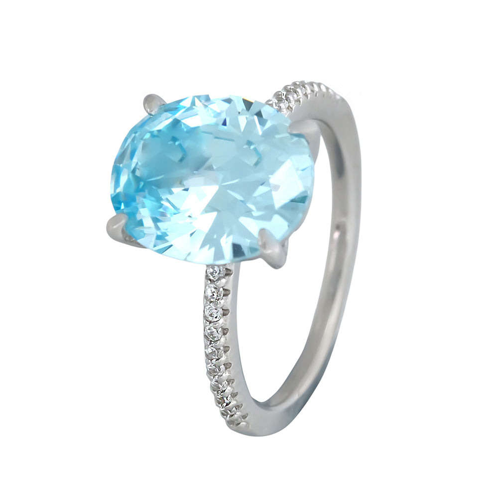 Aquamarine ring with oval aquamarine in claws