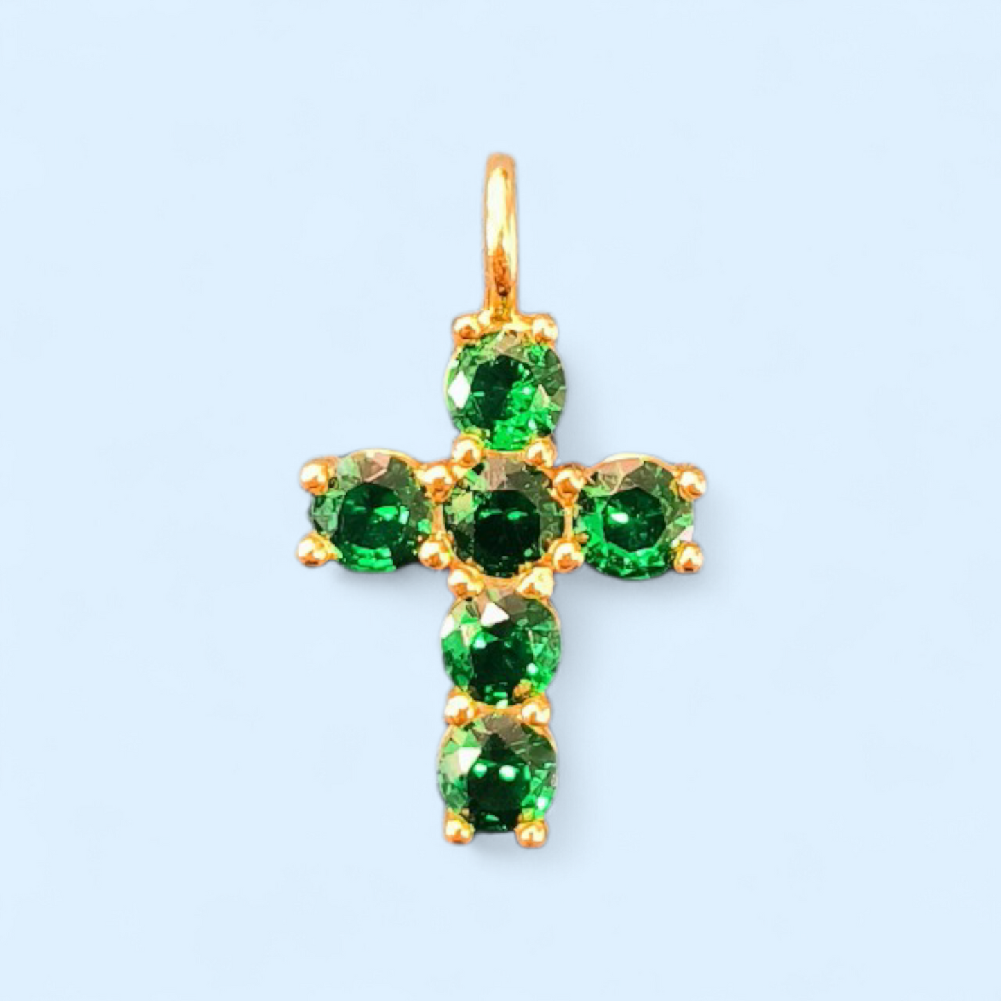 Cruz pequeña con circonitas verde esmeralda